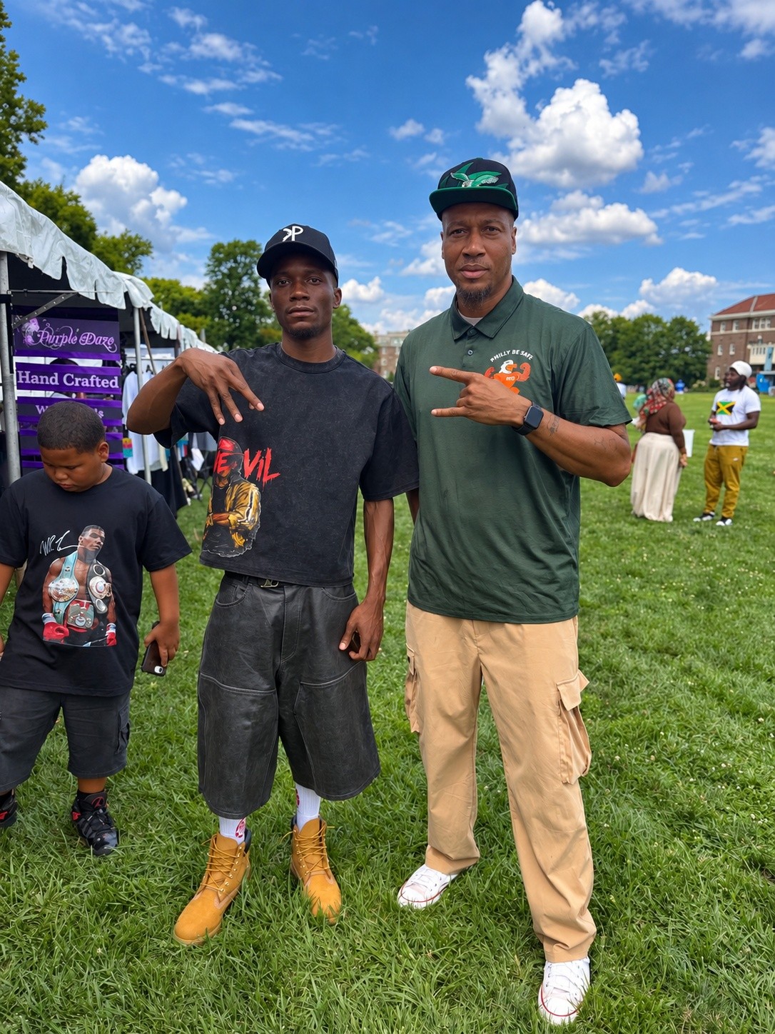 Philly Be Safe representatives connecting with community members at an outdoor event